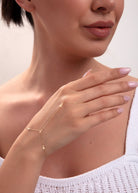 14K Guld Handkedja Dam Med Korsdetaljer Och Elegant Minimalistisk Design - Noxlookjewelry