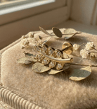 14K Guld Piercing Med Bladkvistmotiv Och Elegant Botanisk Design - Noxlookjewelry