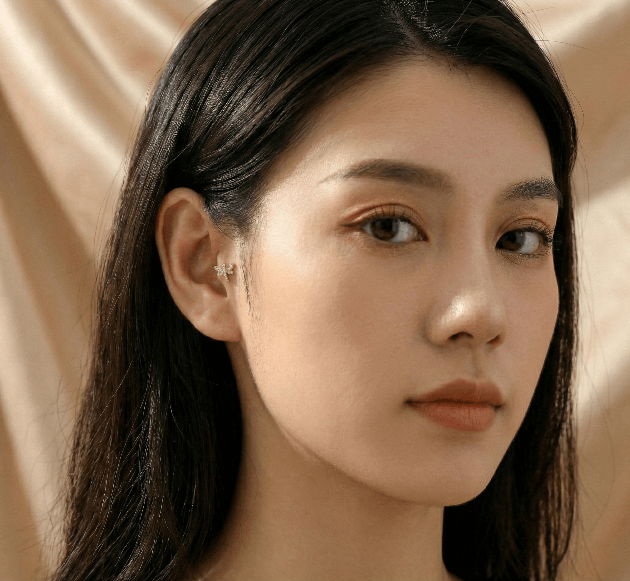 14K Guld Traguspiercing Med Fjärilsmotiv I Elegant Öppen Design - Noxlookjewelry